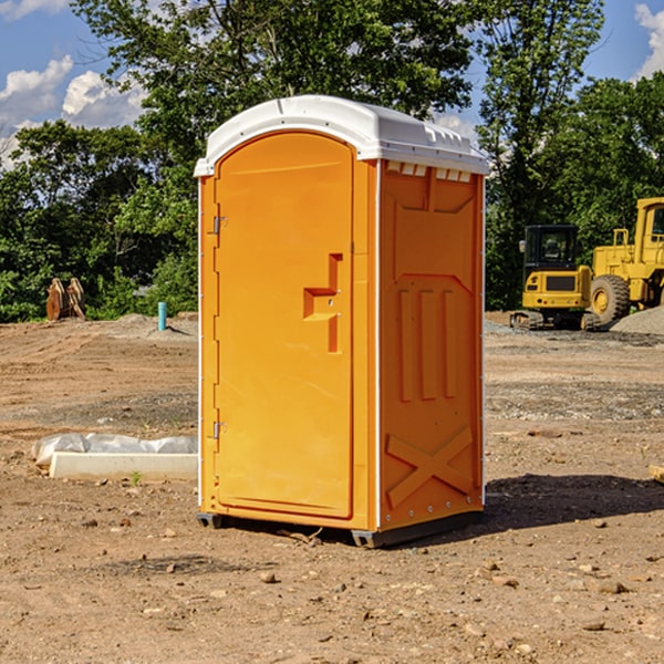 how often are the porta potties cleaned and serviced during a rental period in Four Corners